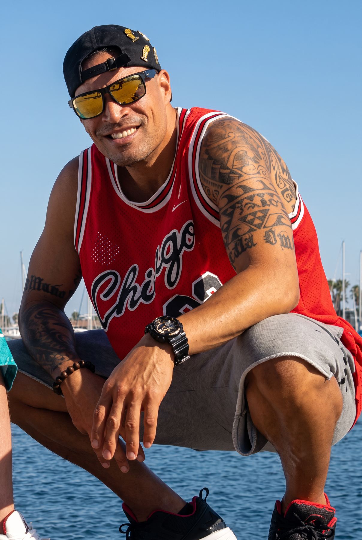 Portrait of Coach Jason Pabillano beside the water