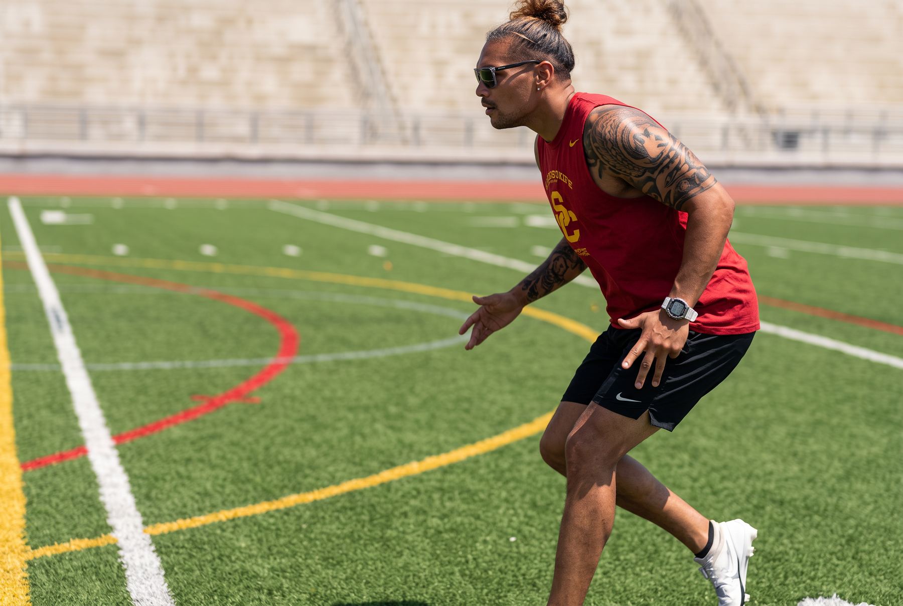 Coach Jason demonstrating an acceleration pattern on the field